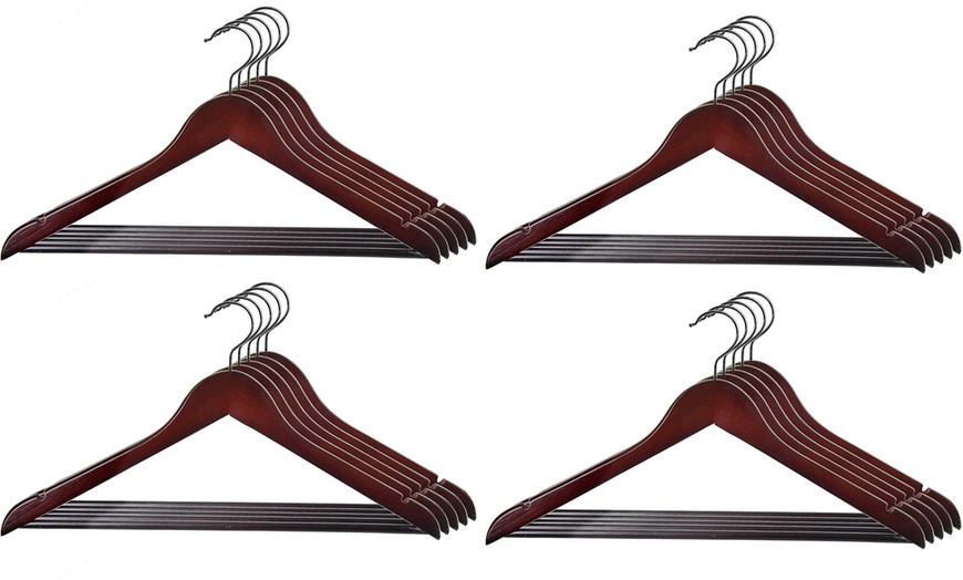 Image 5: 10 Wooden Hangers