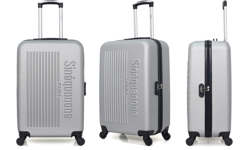 Image 12: Set of Three Suitcases