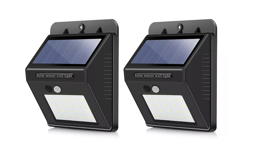 Image 3: Up to Four LED Wall Lights with Solar Panel and 120° Motion Sensor