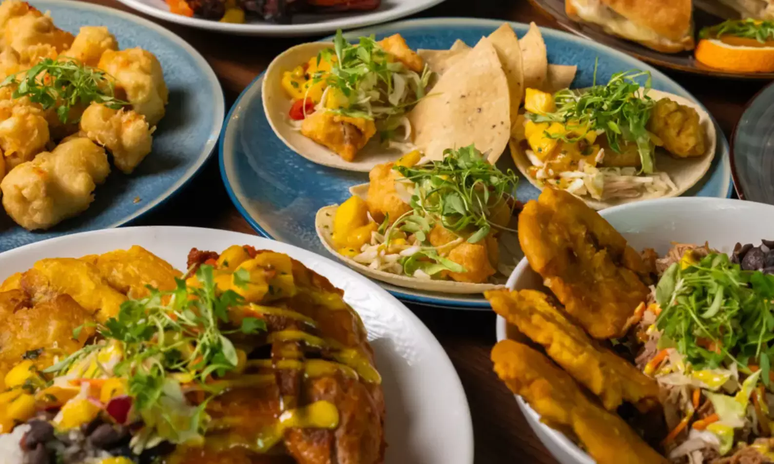 Savor a 2-Course Chef-Driven Dining Experience with Cocktails for Two or Four, or Dining Credit (Up to 60% Off)