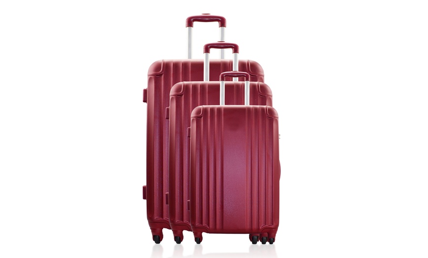 Image 2: Set of Three ABS Suitcases