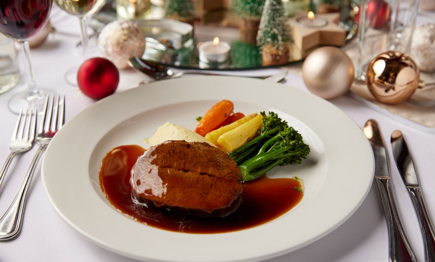 Image 1: Festive Meal with a Glass of Champagne for Two