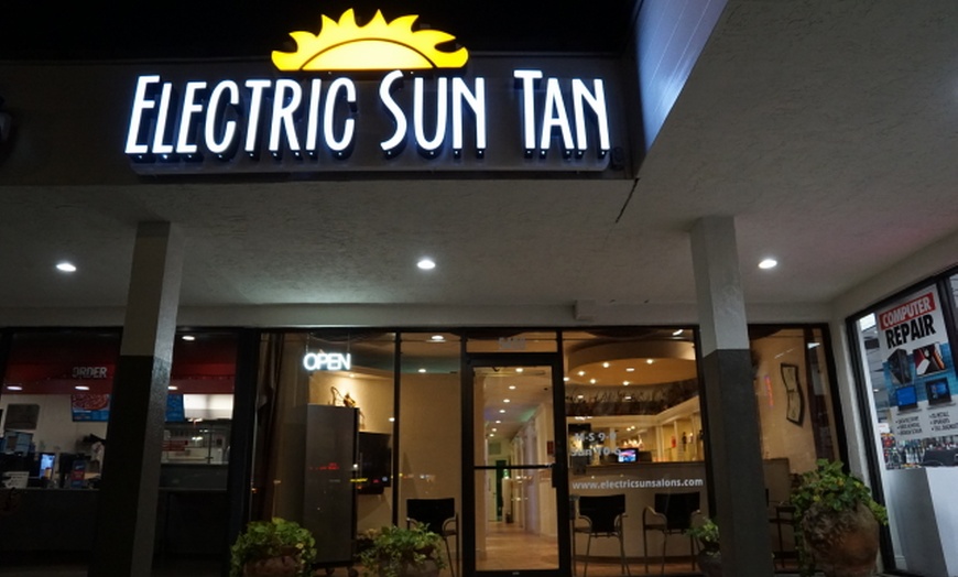 Image 10: Choose from "The Grand Tour" Tanning Bed or VersaSpa Spray Tan