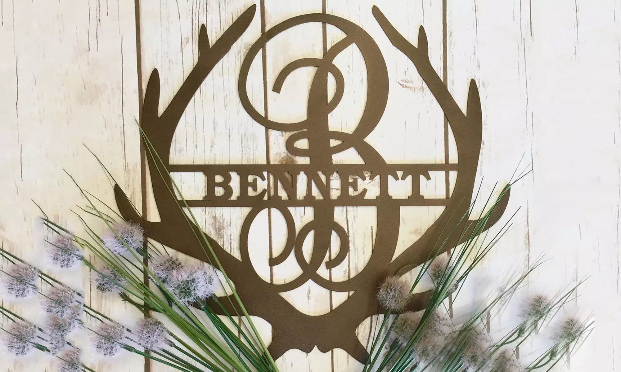One or Two 11.5" Personalized Family Name Antler Signs from Metal Unlimited (Up to 51% Off) - Primary Image