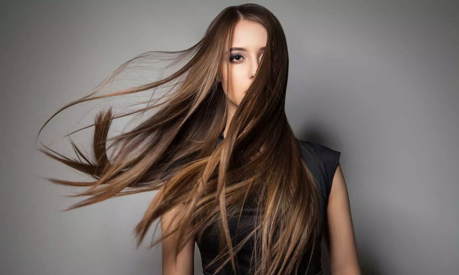 One or Two Magic Sleet Hair Treatments with Optional Haircut at World Beauty Center (Up to 55% Off) - Primary Image