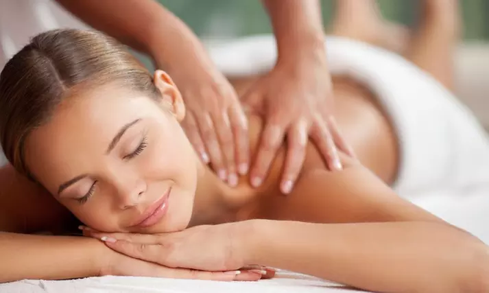 1-Hour Therapeutic, Deep Tissue, or Hot Stone Massage w/Aromatherapy & More at A Touch With Love (Up to 32% Off) - Second Medium