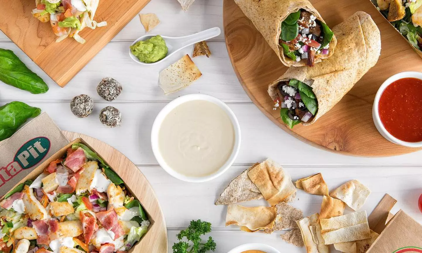 $15, $30 or $60 Toward Food & Drink from Pita Pit (Up to 33% Off) - Primary Image