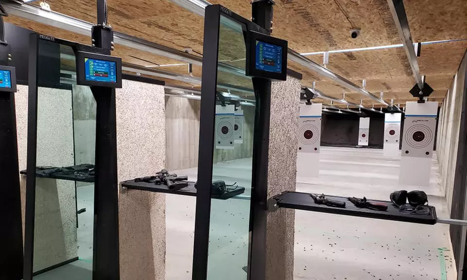 Gun Rental, Range Fee, and 50 Rounds of 9mm Ammunition for 1 or 2 at Northern Elite Firearms (Up to 50% Off) - Primary Image