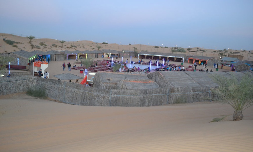 Image 3: Enjoy a VIP Desert Safari Including Dune Bashing and Camel Ride!