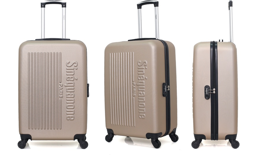 Image 26: Set of Three Suitcases