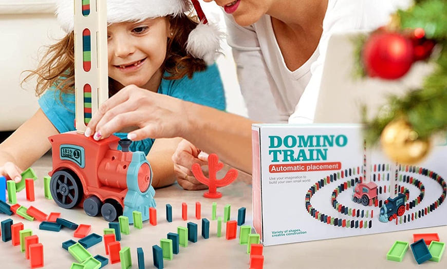 Image 2: Automatic Domino Laying Electric Train Toy Set