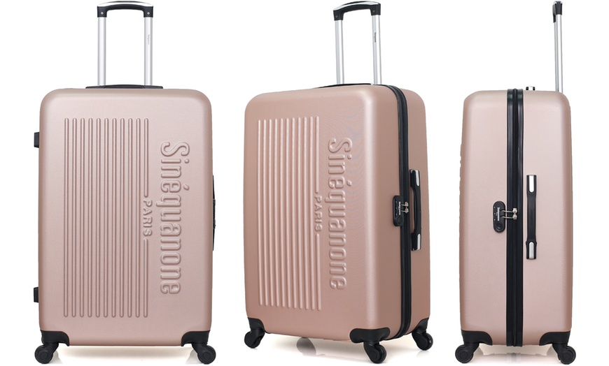 Image 31: Set of Three Suitcases