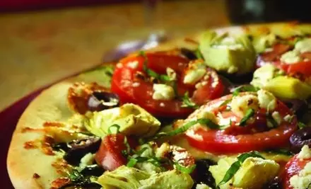 $7 for $15 Worth of Sandwiches, Pizza, and Burgers at The Loop Pizza Grill - Primary Image