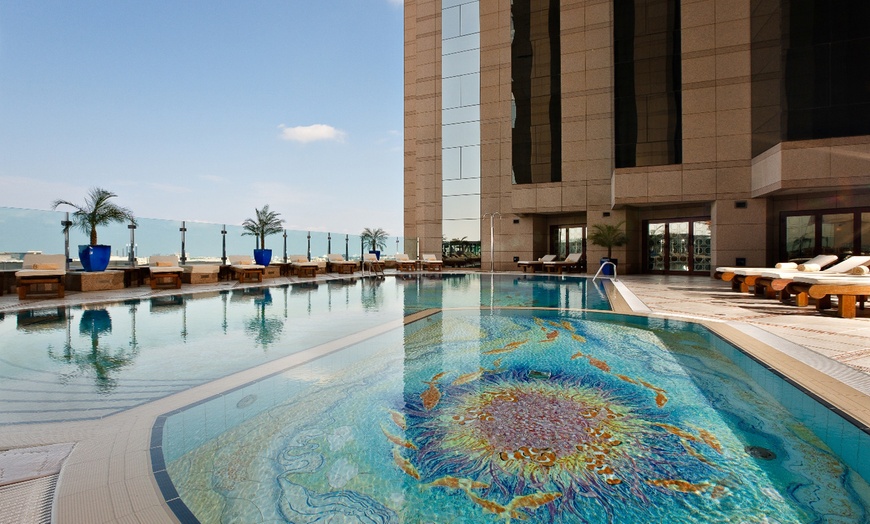 Image 1: Pool Access and AED 100 Spend at Fairmont Dubai 