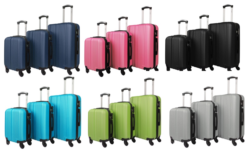 Image 1: Three-Piece Luggage Set with Spinner Wheels and Secure Locks