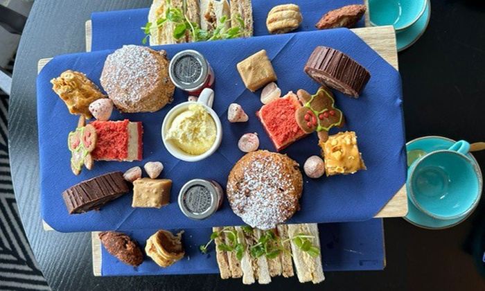 Afternoon tea with glass of prossecco