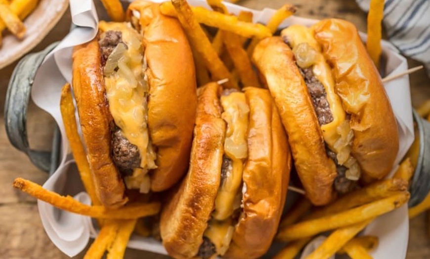 Image 1: Choice of Burgers, Chips, and Drink for Two or Four at Cafeto