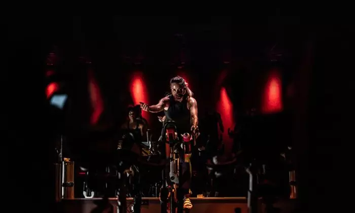 Dive into CycleBar Dr Phillips' indoor cycling classes, with options for up to 32% off premium sessions. - Primary Image