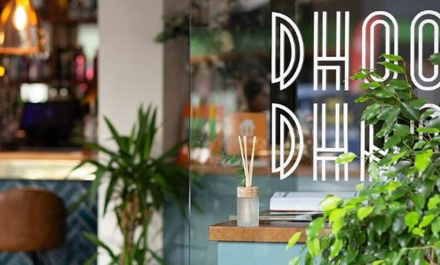 Image 1: Up to 67% Off on Indian Cuisine at Dhoom Dhaam Restaurant and Bar