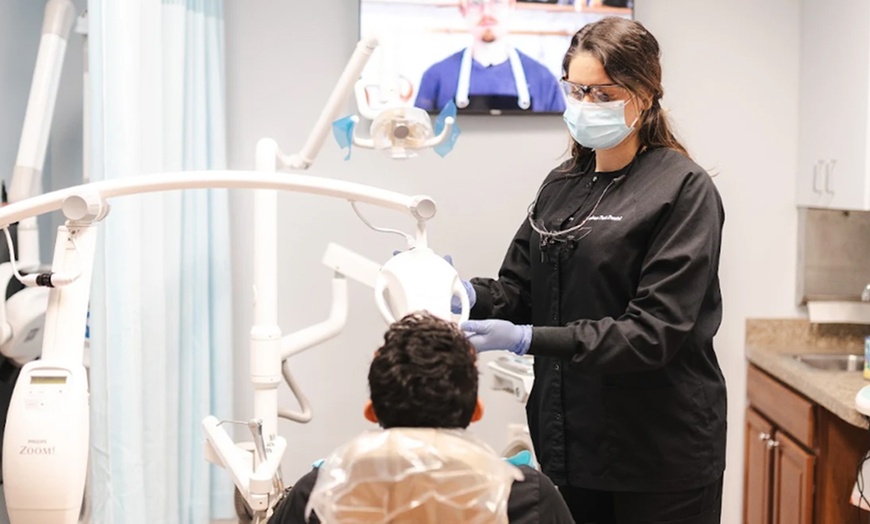 Image 1: Single or Multi-Session Teeth Cleaning Packages for Adults or Families