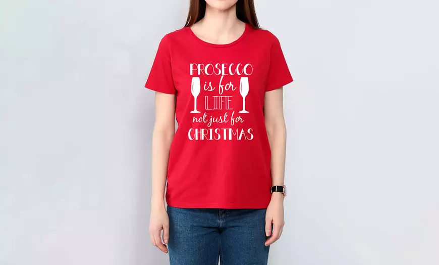 Image 17: T-shirts met kerstslogan