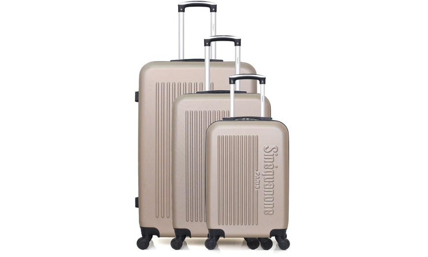 Image 23: Set of Three Suitcases