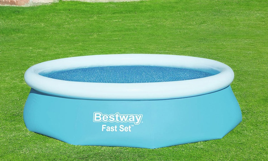 Image 1: Bestway Flowclear Solar Swimming Pool Cover Collection
