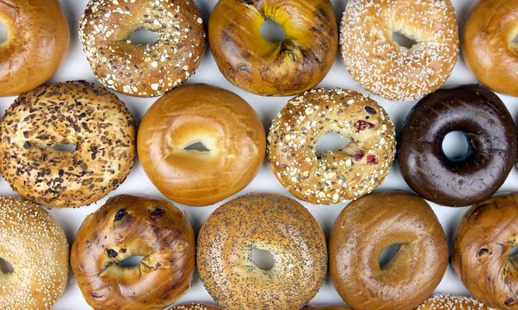 Hand-rolled NYC Bagels, baked fresh from New Yorker Bagels (Up to 50% Off). Seven Options Available.  - Primary Image