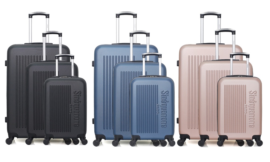 Image 1: Set of Three Suitcases