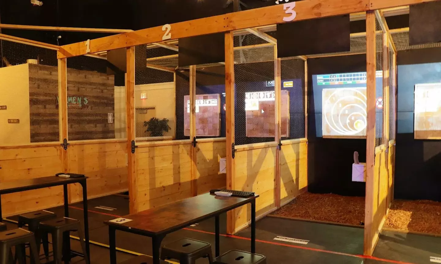Experience Axis Range's thrilling axe throwing and shooting simulator for groups with up to 41% off. - Primary Image