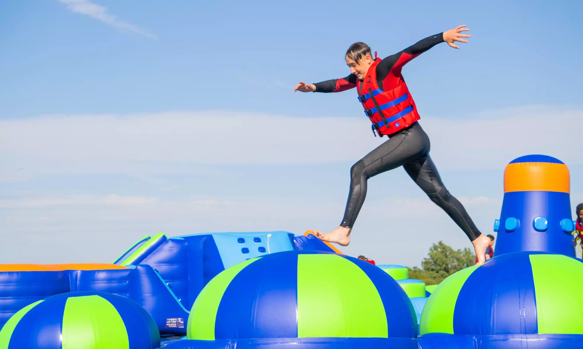 Enjoy Inflatable Aqua Park Entry on an Idyllic Lake in Essex