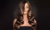 Get Haircut, Highlights, Color Touch-Up, or Silk Press Up to 54% Off at The Luxury Suite Salon & Spa