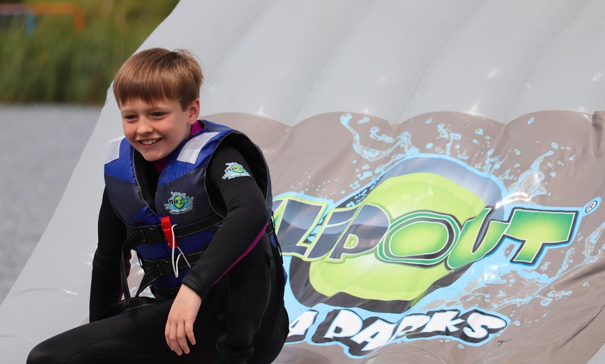 Image 1: Aqua Park Entrance with Wetsuit