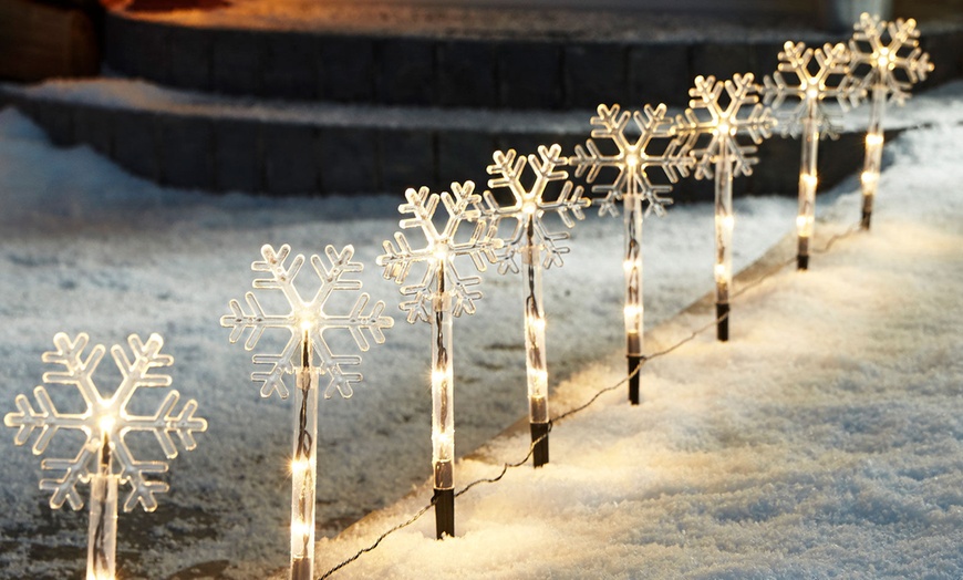 Image 1: Eight-Pack Snowflake LED Pathway Lights
