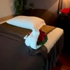 Image 1: 60 or 90-Minute Deep Tissue Massage with Hot Stones & Aromatherapy