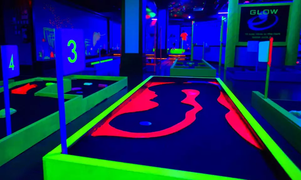 18 Holes of Glow-in-the-Dark Mini Golf for Four or Six or Birthday Party at Glow Mini Golf (Up to 50% Off) - Primary Image