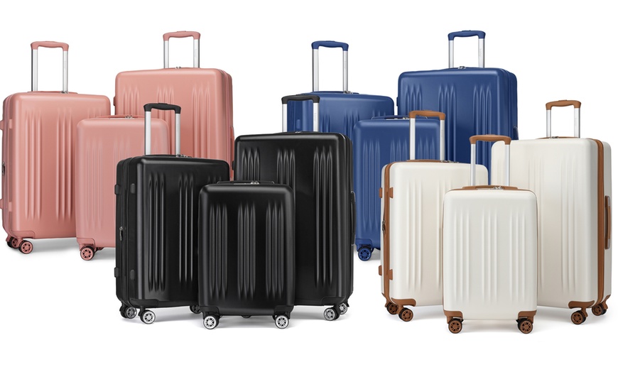 Image 1: One- or Three-Piece Sleek Striped Expandable ABS and PC Suitcases