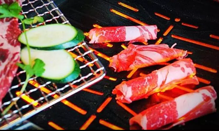All You Can Eat Sushi and Korean BBQ Dinner for Two or Four at Izziban Sushi And BBQ (Up to 42% Off) - Primary Image