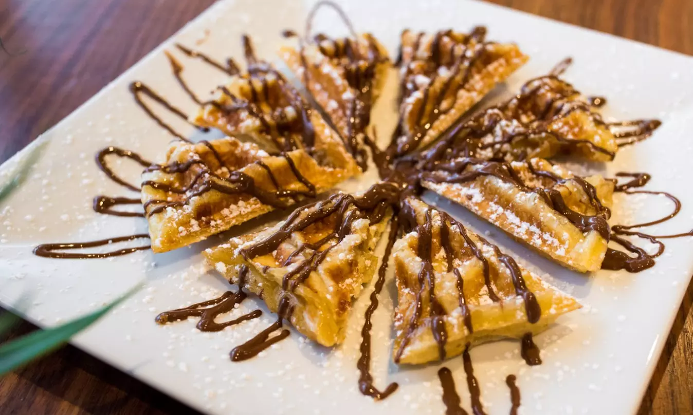 $15, $20, $25, or $50 Value towards Food and Drinks at Kudo Society Cafe (Up to 35% Off) - Primary Image