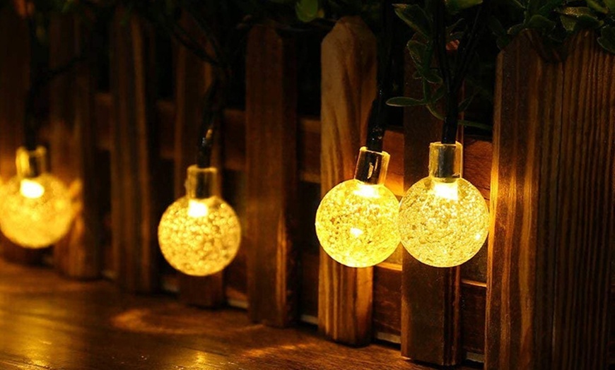 Image 7: One or Two Sets of 50-LED Solar Garden String Lights