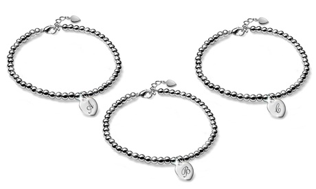 Bracciali con iniziale e ciondolo a cuore disponibile con varie lettere o senza iniziale