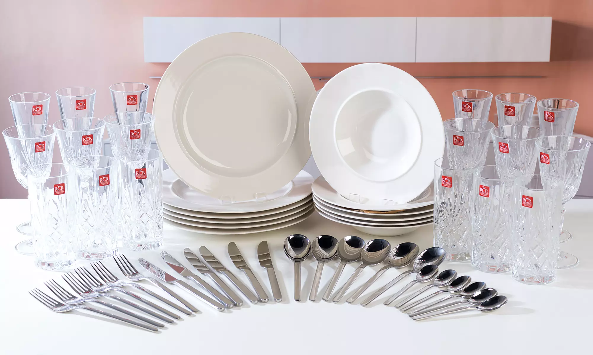 Alessi La Bella Tavola Dinner Service with Bellevue by Villeroy & Boch Cutlery and RCR Melodia Crystal Glassware. - Primary Image