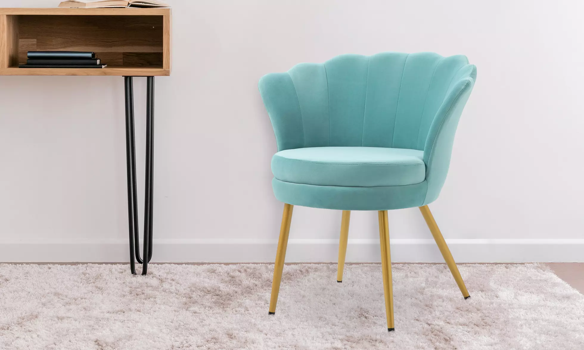 Poltrona in velluto a conchiglia