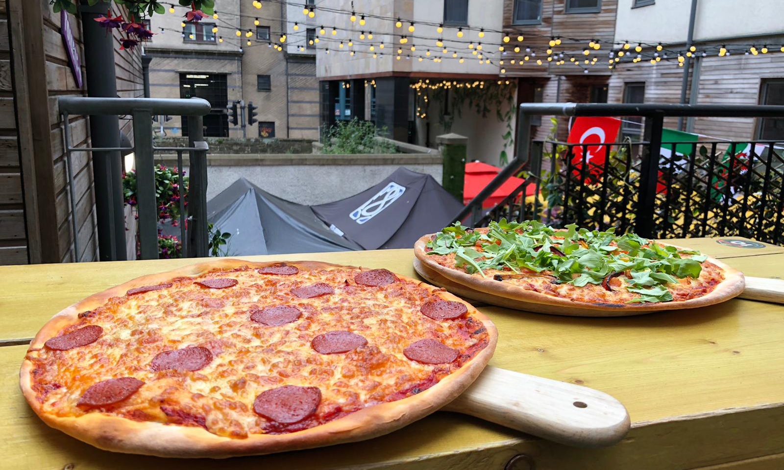 Savor the Flavor: Pizza, Drinks, and Pool Save Big!