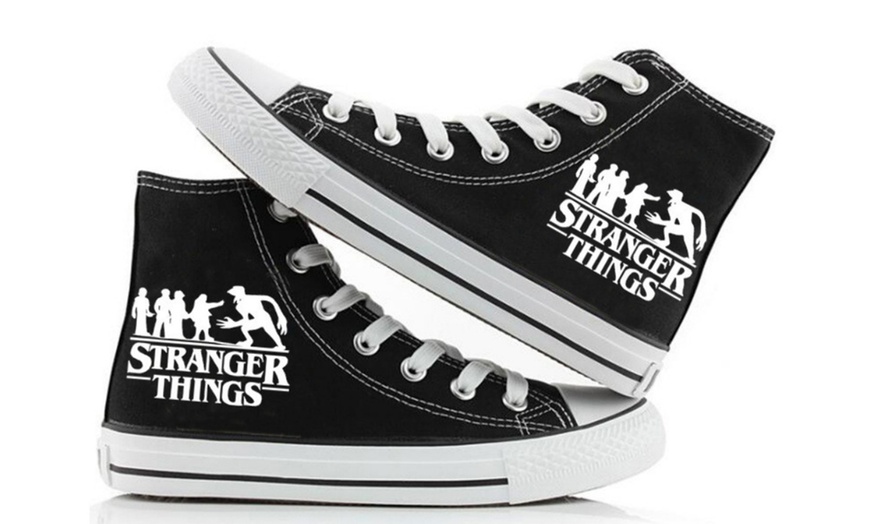 Image 6: Stranger Things Inspired Glow-in-the-Dark High-Top Trainers