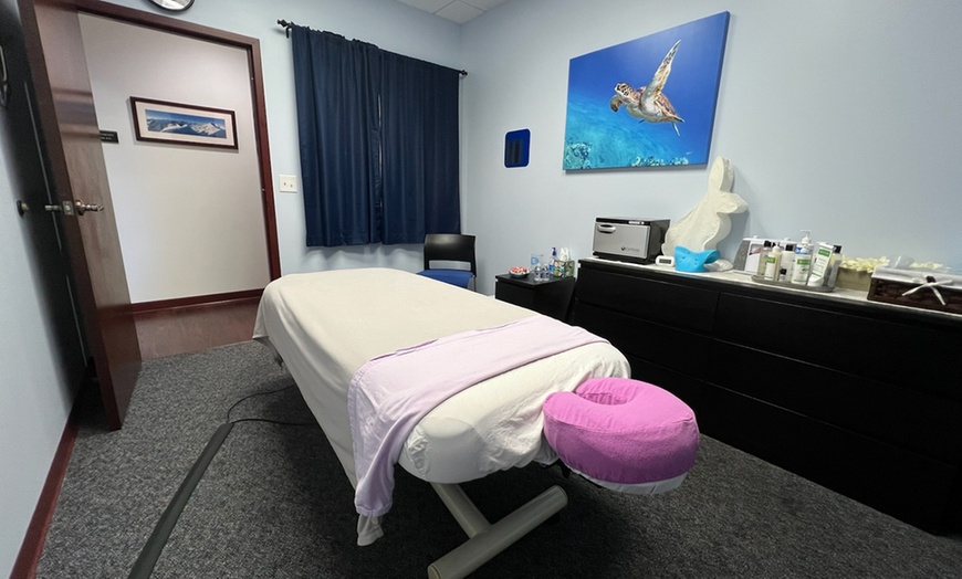 Image 3: 60 or 90-Minute Massage with Laser Therapy or Spinal Decompression