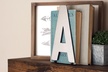 One, Three, Five, or Seven 6" Metal Designer Alphabets with Standing Tabs from Rusted Orange (Up to 82% Off) - Second Medium