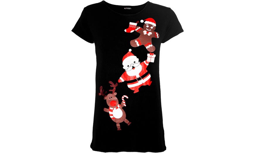 Image 6: T-shirt avec différents imprimés au motif de Noel