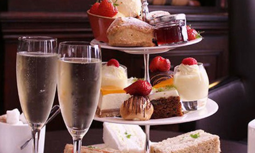 Image 1: Authentic Irish Afternoon Tea at Cappuccino Bar: Taste the Dublin Vibe