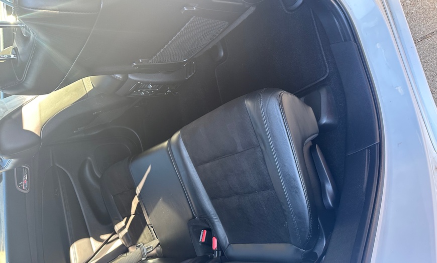 Image 4: Treat Your Ride to a Shiny Makeover with Car Detailing: The Scotty or Overtime Detail for One Car, SUV, Truck, or Van